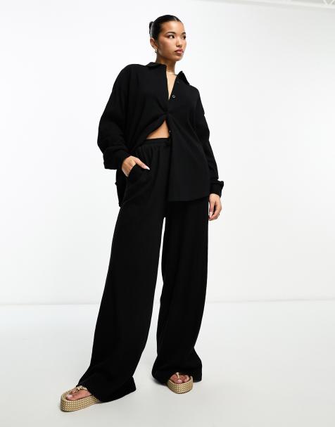 ASOS DESIGN crinkle shirred waist wide leg pants in black - part of a set - view 1