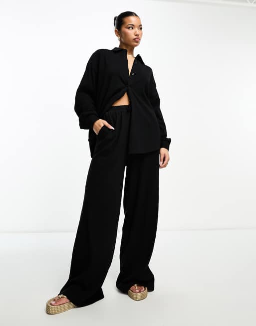 ASOS DESIGN crinkle shirred waist wide leg pants in black - part of a set 