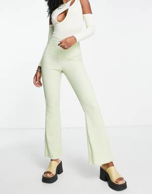 ASOS DESIGN crinkle texture flare pants in green