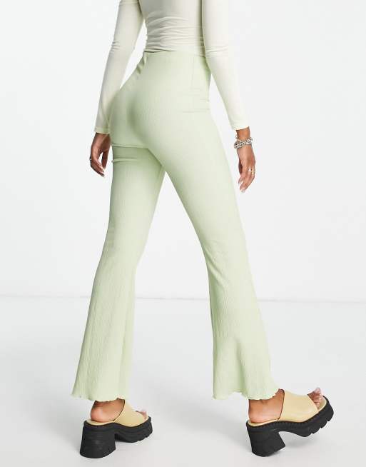 ASOS DESIGN crinkle texture flare trouser in green, 2 of 4