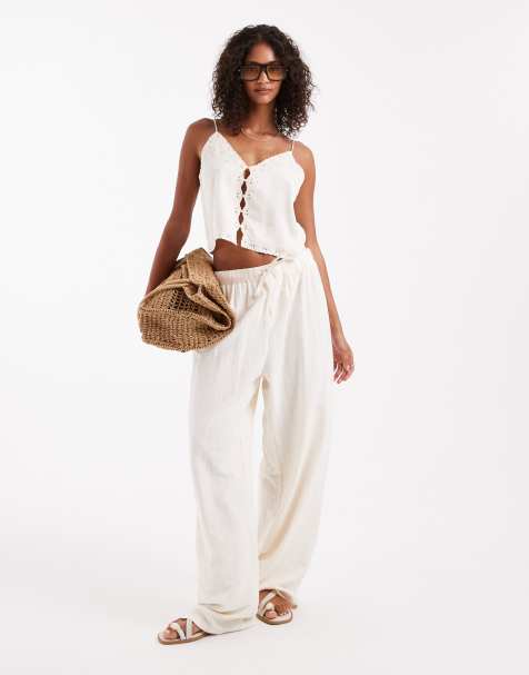 ASOS DESIGN crinkle texture pull on trousers in stone - view 1