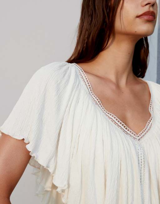 ASOS DESIGN crinkle tie back cape top in ecru