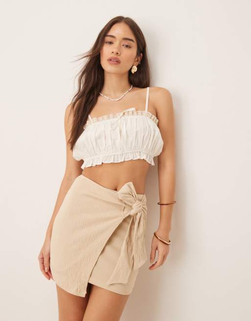 ASOS DESIGN crinkle tie side mini skirt in stone