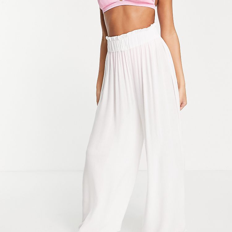 ASOS DESIGN crinkle wide leg palazzo beach pants in white | ASOS ASOS DESIGN crinkle wide leg palazzo beach pants in white | ASOS