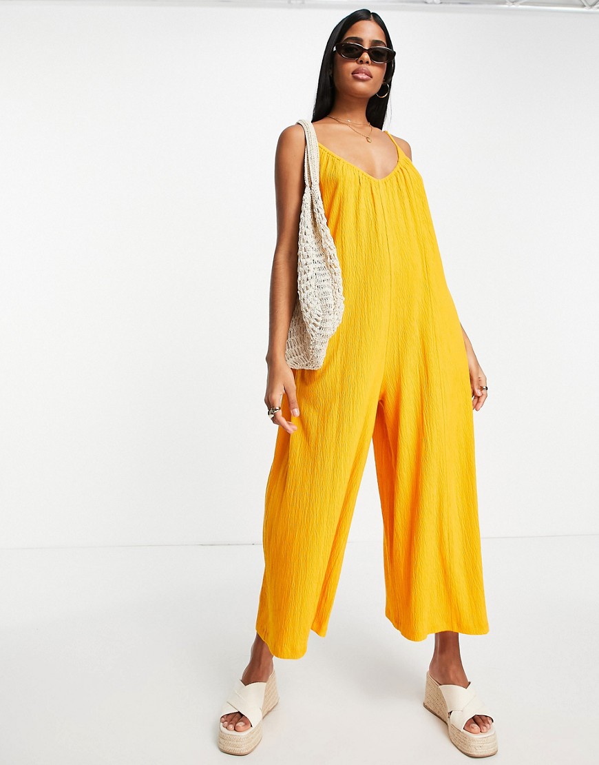 ASOS DESIGN crinkled minimalist wide leg cami jumpsuit in orange