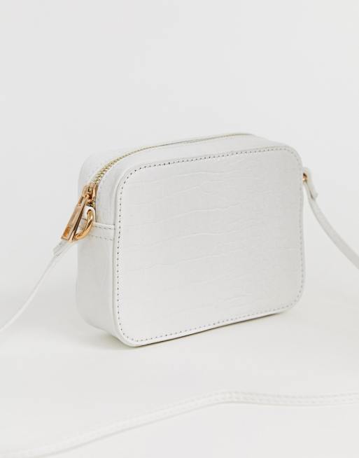 ASOS DESIGN faux leather croc crossbody camera bag in off white