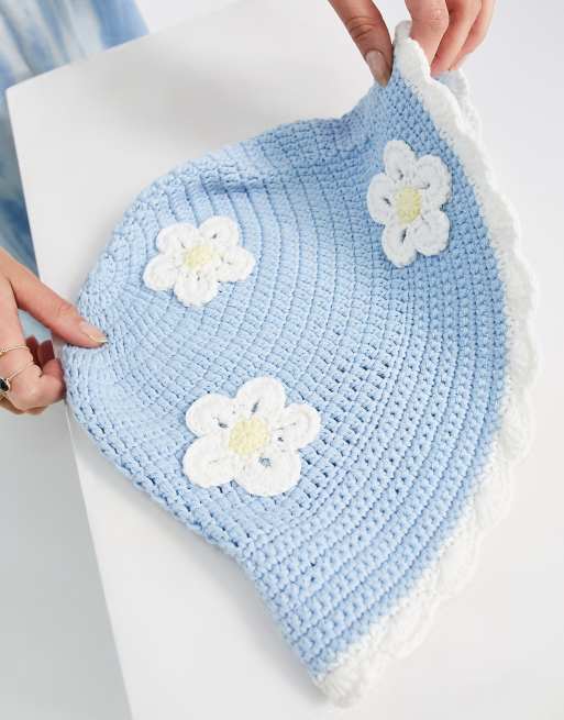 ASOS DESIGN crochet bucket hat with daisy embroidery in blue