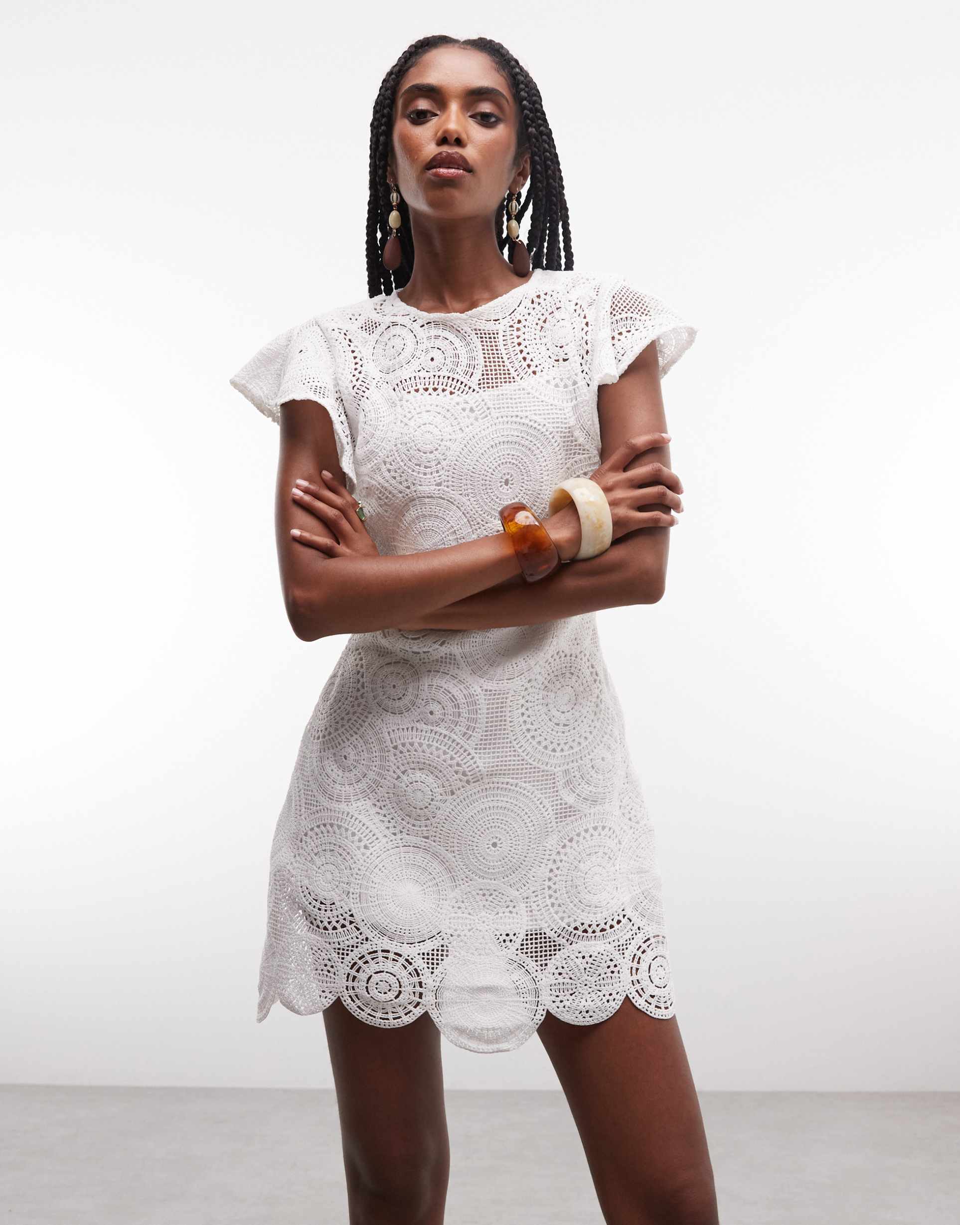 asos design crochet flutter sleeve mini dress in ivory