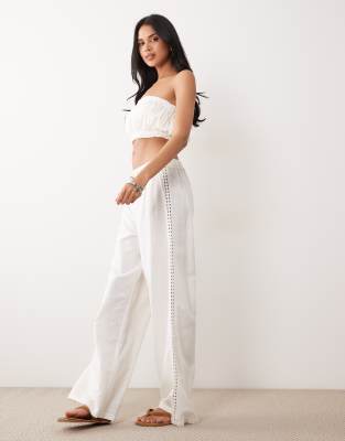 ASOS DESIGN crochet insert wide leg pants with tassel tie in ivory - part of a s