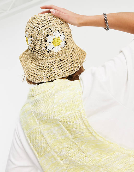 ASOS DESIGN crochet straw bucket hat with flower and size adjuster in natural