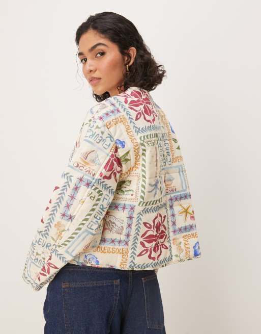 ASOS DESIGN crop collarless quilted jacket in postcard print