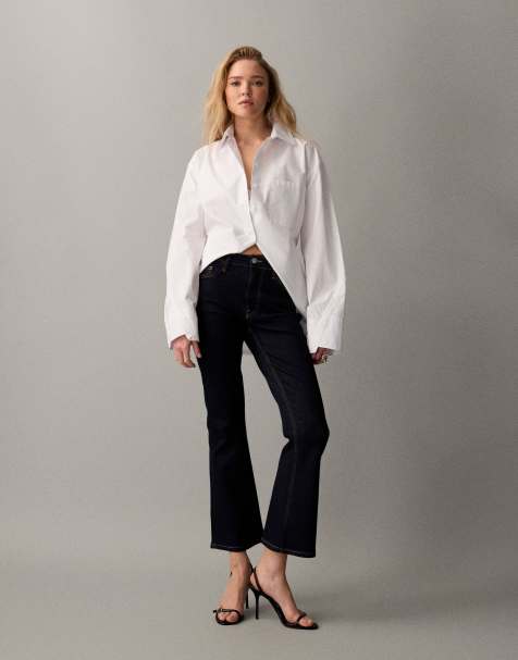 ASOS DESIGN crop kick flare jeans in rinse - view 1