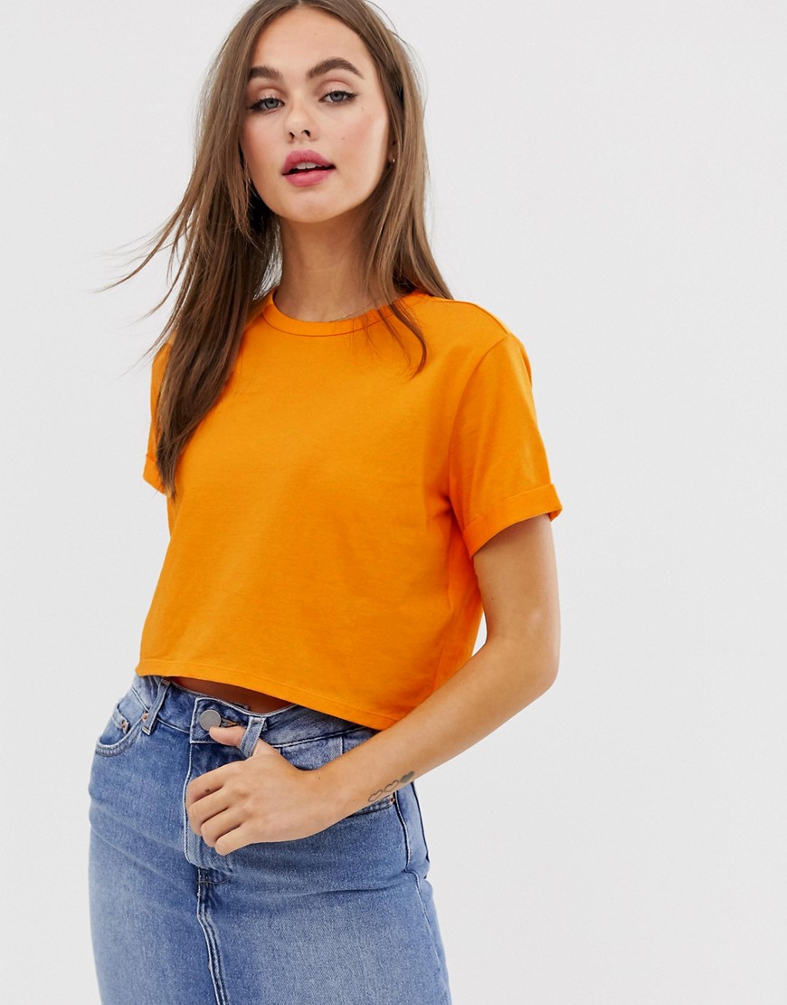 ASOS DESIGN - Crop T-shirt van biologisch katoen en omgeslagen mouwen in oranje