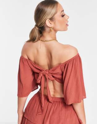 ASOS DESIGN - Crop top de plage fluide avec nœud dans le dos - Rouille