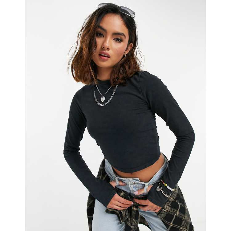 ASOS DESIGN Crop top manches longues avec trou pour le pouce