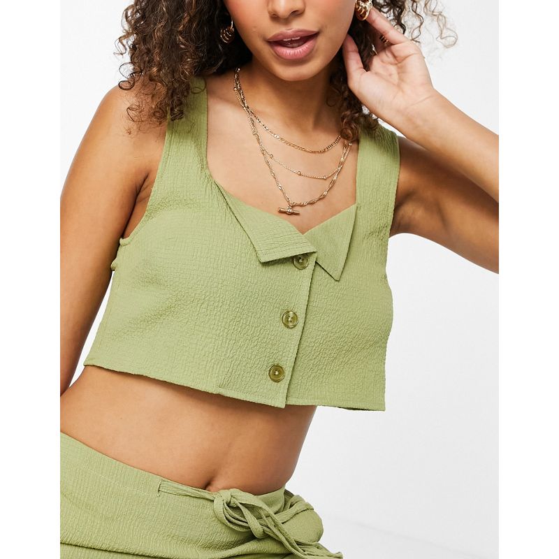 Pantaloni e leggings Donna DESIGN - Coordinato con crop top e pantaloni a zampa in tessuto stropicciato, colore verde