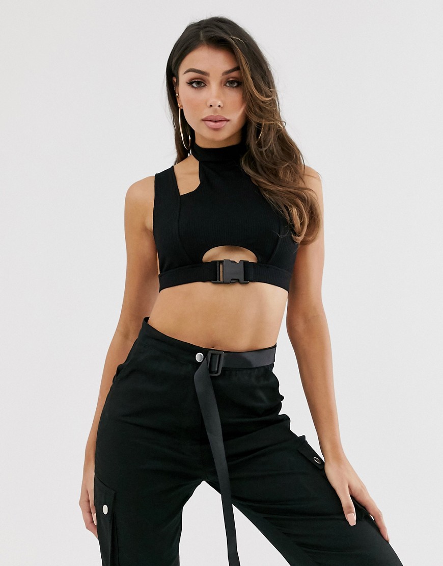 ASOS DESIGN crop top with cut out details and buckle back in black