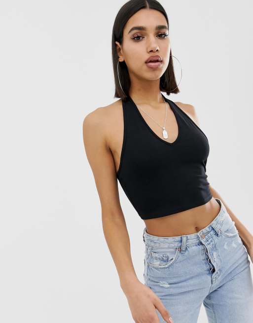 ASOS DESIGN crop top with halter neck in black