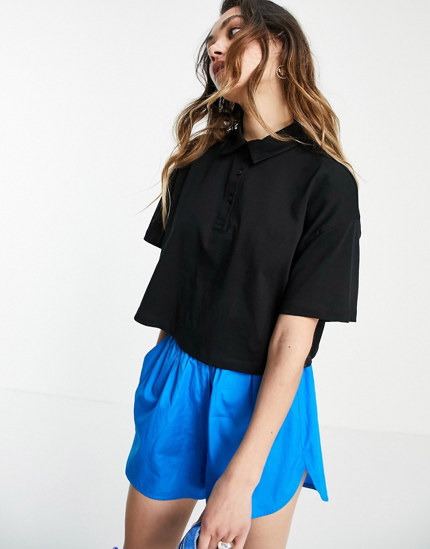 ASOS DESIGN cropped boxy polo with short sleeve in black