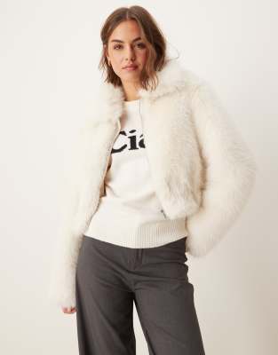 cropped faux fur bomber jacket in cream-Black