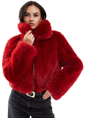 cropped faux fur bomber jacket in red-Black