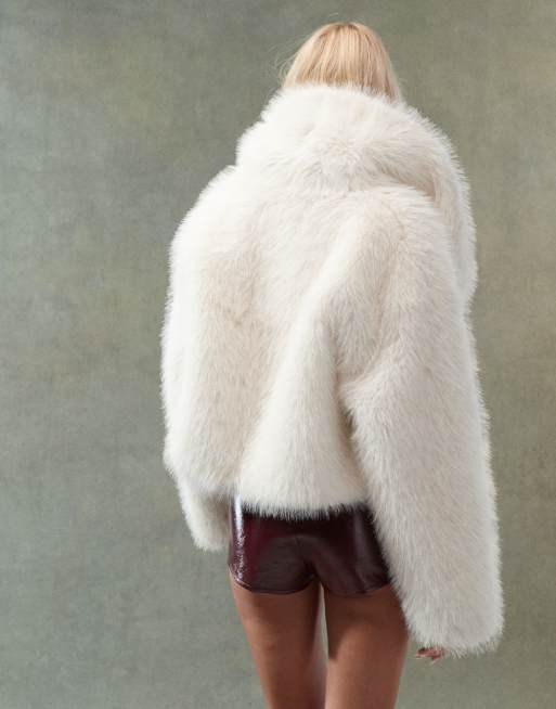 ASOS DESIGN cropped faux fur jacket in cream tipped