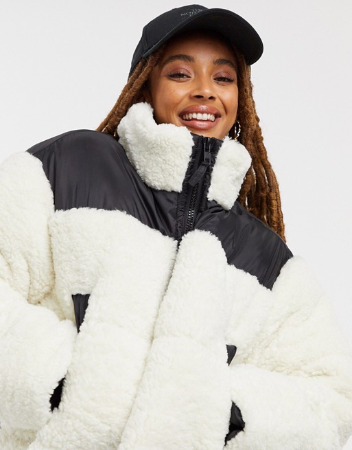 ASOS DESIGN cropped fleece patched puffer jacket