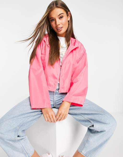 Rain jacket and windbreaker in fluorescent pink