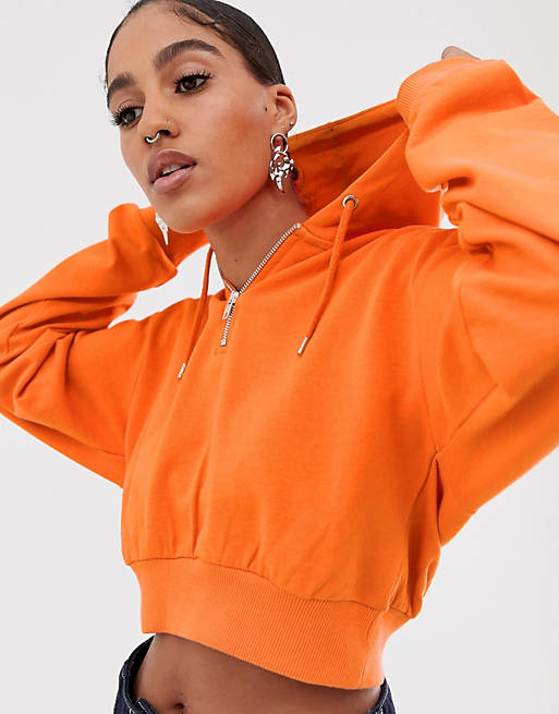 ASOS DESIGN cropped hoodie with half zip in orange