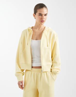 ASOS DESIGN - Cropped-Kapuzenjacke in Gelb mit weicher Innenseite