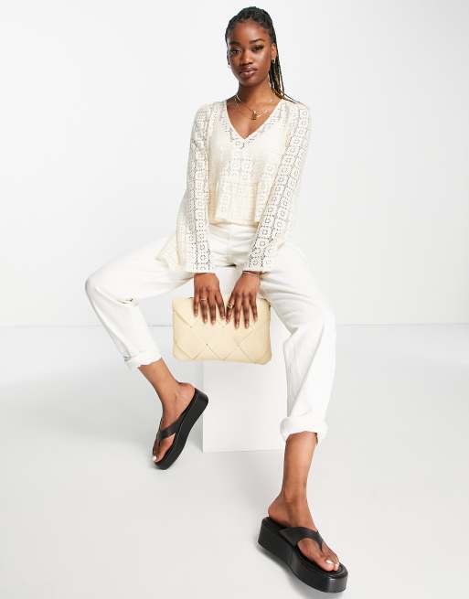 ASOS DESIGN cropped long sleeve crochet top with peplum hem in cream