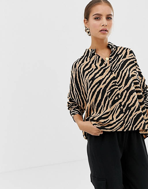 ASOS DESIGN cropped long sleeve shirt in tiger animal print