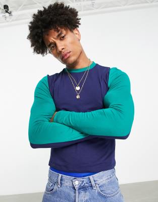 ASOS DESIGN cropped long sleeve t-shirt in navy and green color block with New York city print