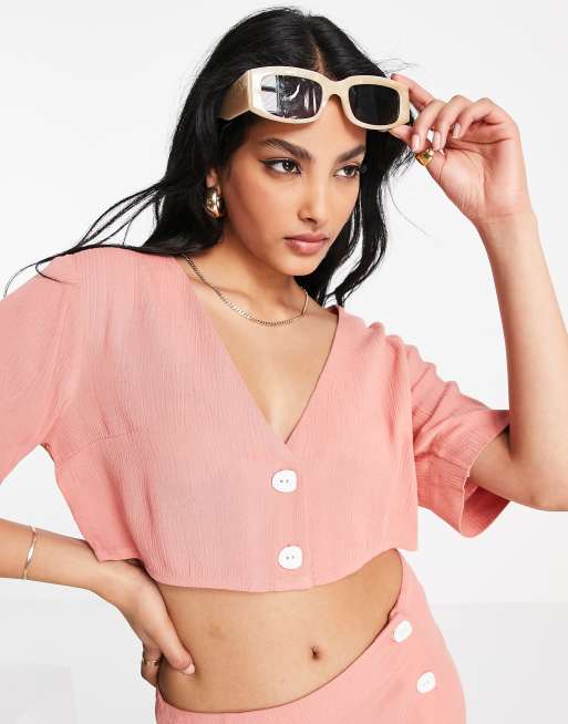 ASOS DESIGN - Cropped overhemd van kreukelstof met knoopsluiting in roze, deel van co-ord set