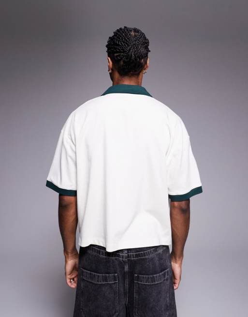 ASOS DESIGN cropped oversized polo with chest embroidery and contrast collar in cream