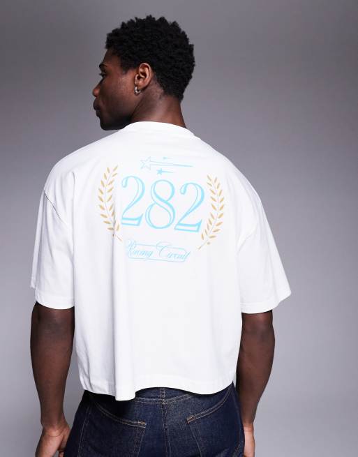 ASOS DESIGN cropped oversized t-shirt with sport graphic in white