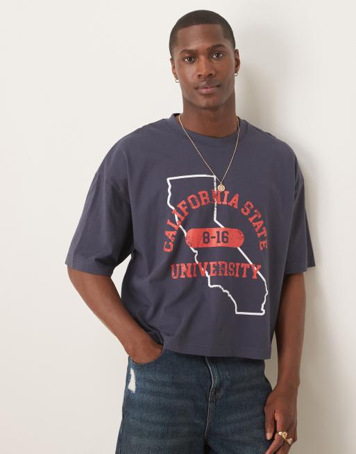ASOS DESIGN cropped oversized T-shirt with varsity graphic in navy