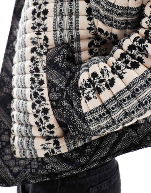 ASOS DESIGN cropped quilted patchwork jacket in black and white floral, 4 of 4