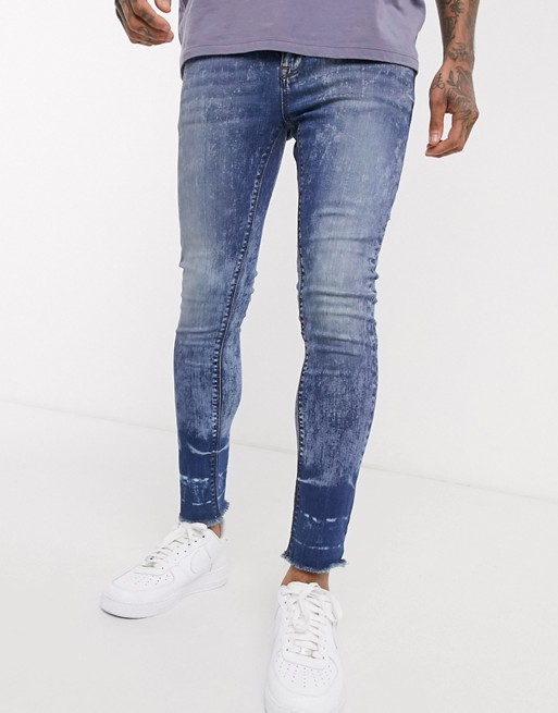 ASOS DESIGN cropped super skinny in mid wash with faded raw hem