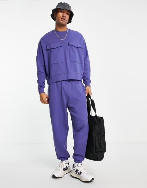 ASOS DESIGN cropped sweatshirt with utility pockets in purple - part of a set