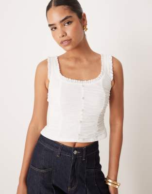 ASOS DESIGN - Cropped Top in Elfenbeinweiß im Milchmädchen-Design mit Knopfleiste-Gelb