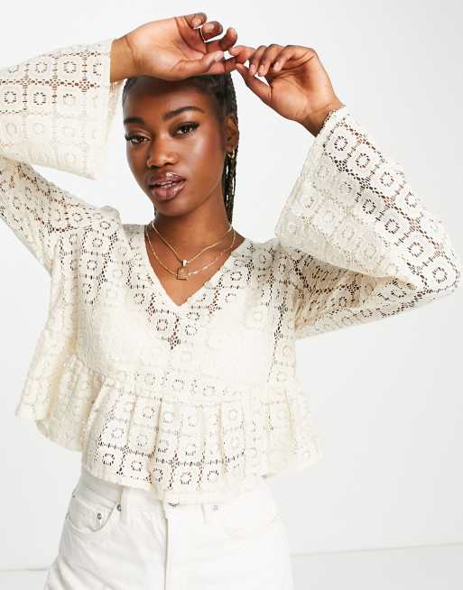 ASOS DESIGN - Cropped top met lange mouwen en peplum zoom in crèmekleur