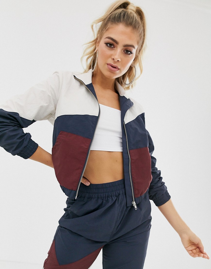 ASOS DESIGN cropped tracksuit jacket in navy colour block