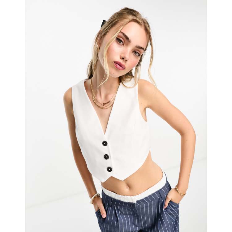 ASOS DESIGN cropped vest with contrast buttons in white