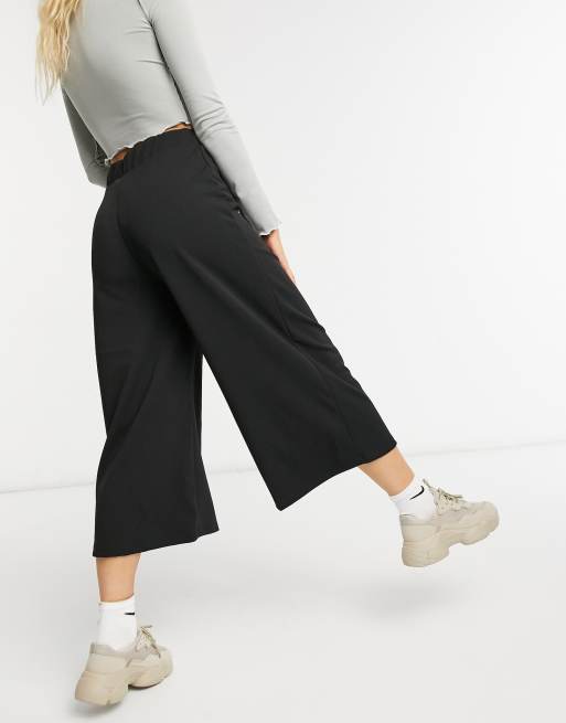 Fonkelnieuw ASOS Design - Cropped zwarte broek met wijde pijpen in jersey PG-73