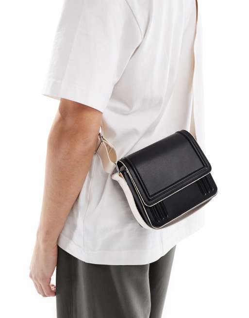 ASOS DESIGN cross-body bag in black with contrast ecru strap and piping