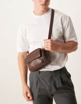 ASOS DESIGN cross body bag with pocket and woven texture in brown