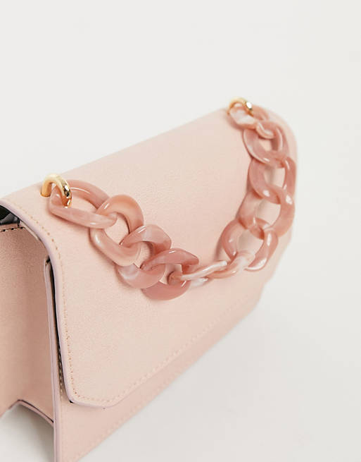 ASOS DESIGN cross body bag with resin top handle chain and detachable strap  in blush