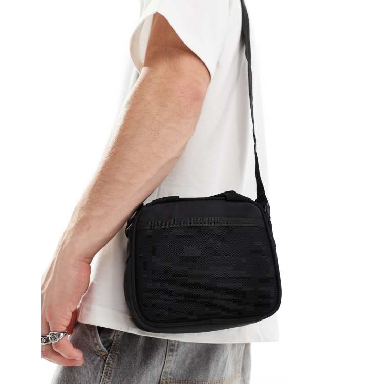ASOS DESIGN cross body bag with top handle in black ASOS