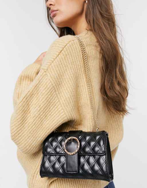 ASOS DESIGN cross body bag with twisted buckle in black quilt